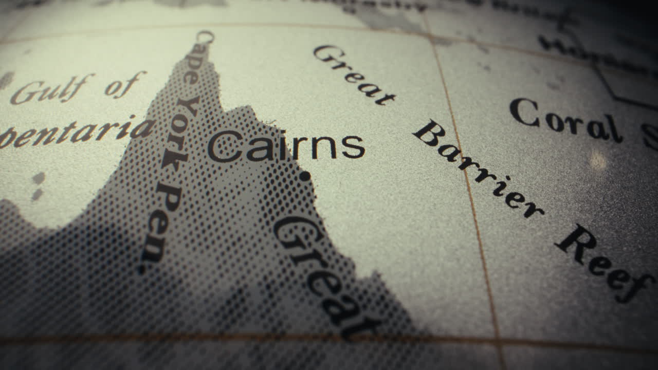 Close-up of a World Globe, Focusing on the Cairns Region of Australia