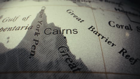close-up of a world globe, focusing on the cairns region of australia