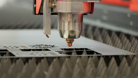 CNC-Laser-cutting-of-metal,-modern-industrial-technology.