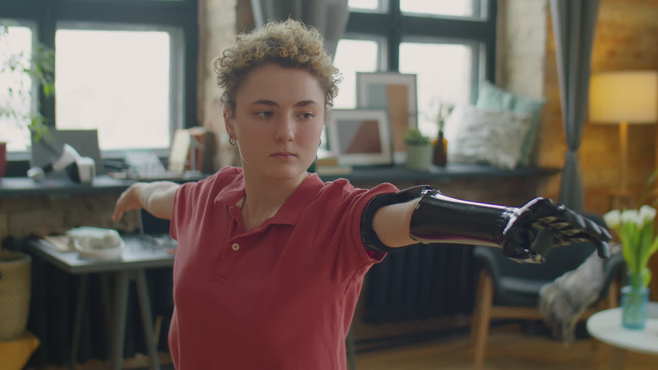 Girl with Prosthetic Arm Having Yoga Workout at Home