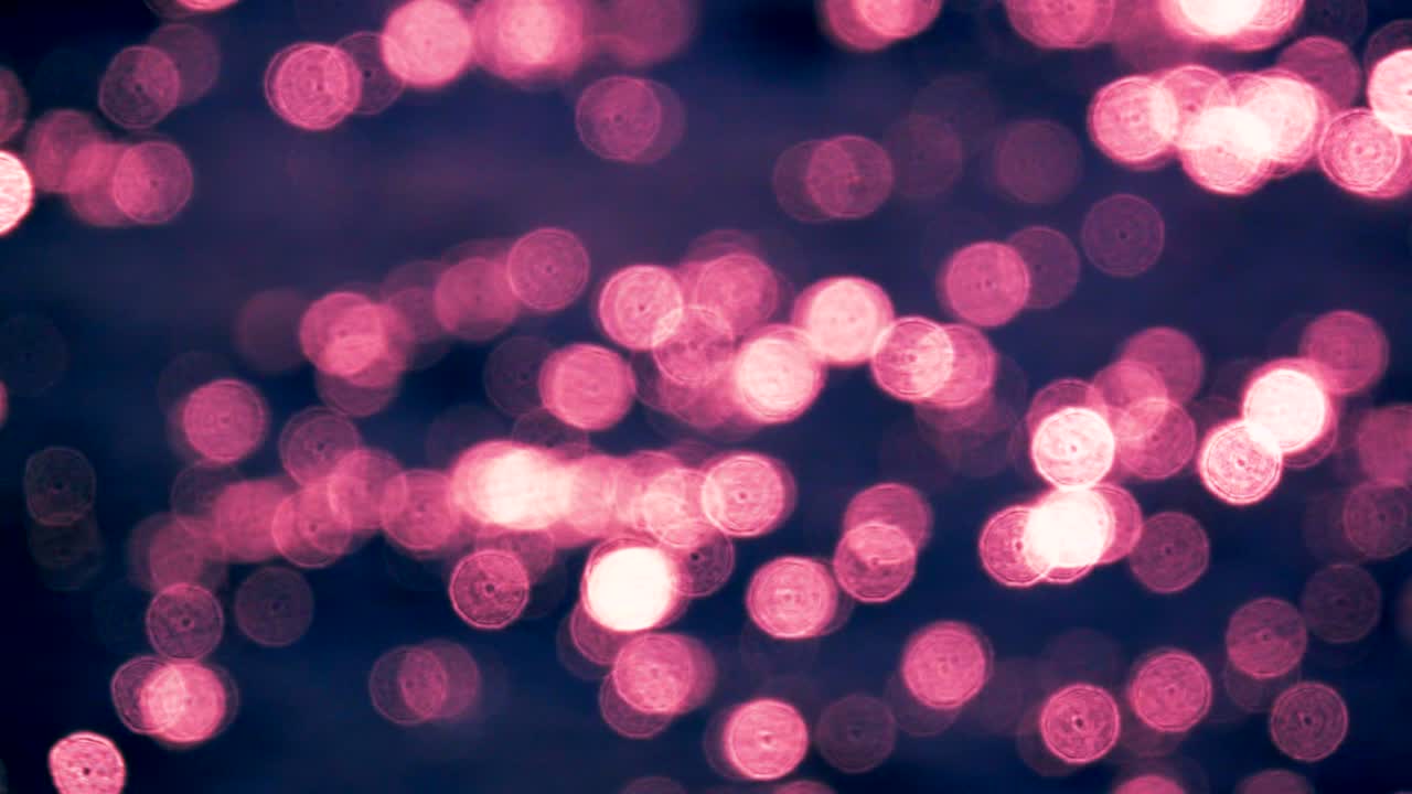 fondo rosado de movimiento de luz bokeh