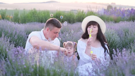portrait of a young happy family having fun at countryside outdoors portrait of a young happy family having fun at countryside outdoors
