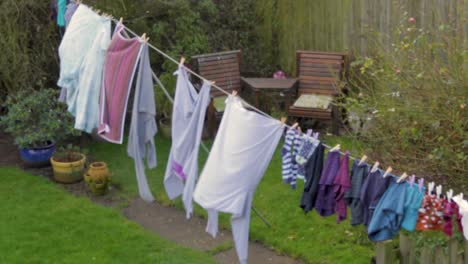 clothing on a washing line drying in the wind in oakham, rutland, uk