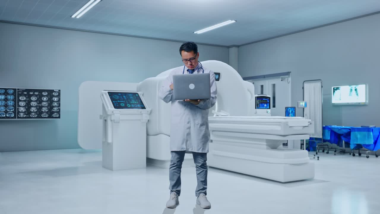 Full Body Of Asian Male Doctor Having A Headache While Working On A Laptop With MRI Machine In The Hospital