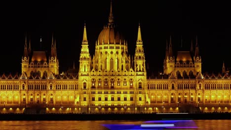 night time lapse of hungarian parliament building, danube river, budapest