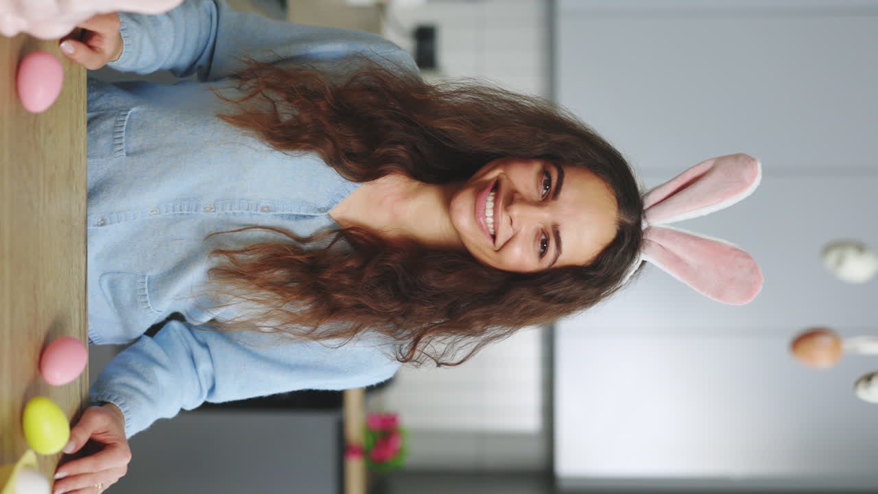 Woman with Easter Bunny Ears in Kitchen
