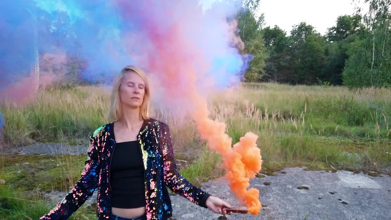 Smooth slow motion cinematic shot of a little bored looking girl on colorful fog shooting at Russians airplane hangar Gimbal foto video shoot on lost places in wild nature 1080, 24p by Philipp Marnitz