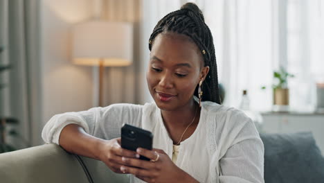 Home,-smile-and-black-woman-on-a-couch