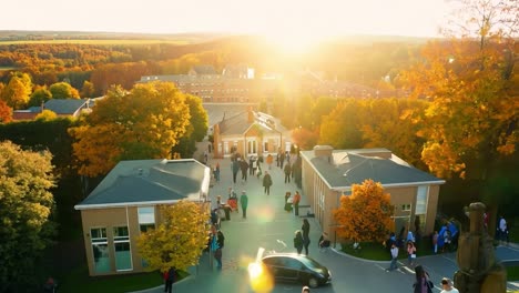 aerial view of a university campus in autumn with people walking on the street