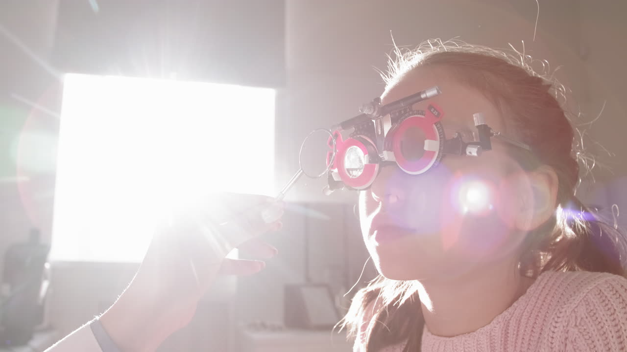 Little Girl Wearing Trial Frame Testing Vision