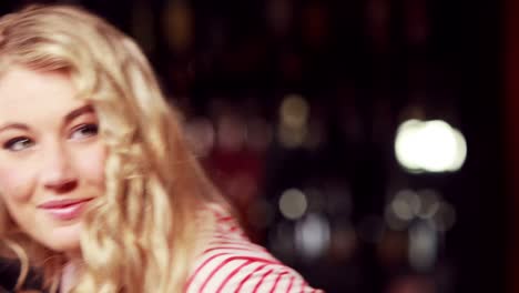 smiling woman at counter