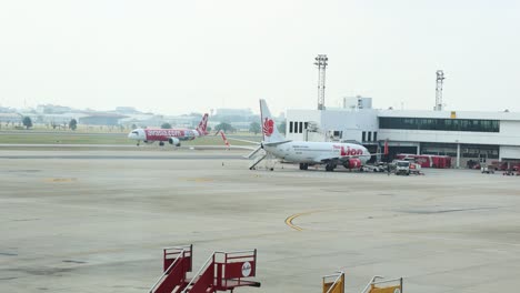 time-lapse of aircraft and vehicles at airport