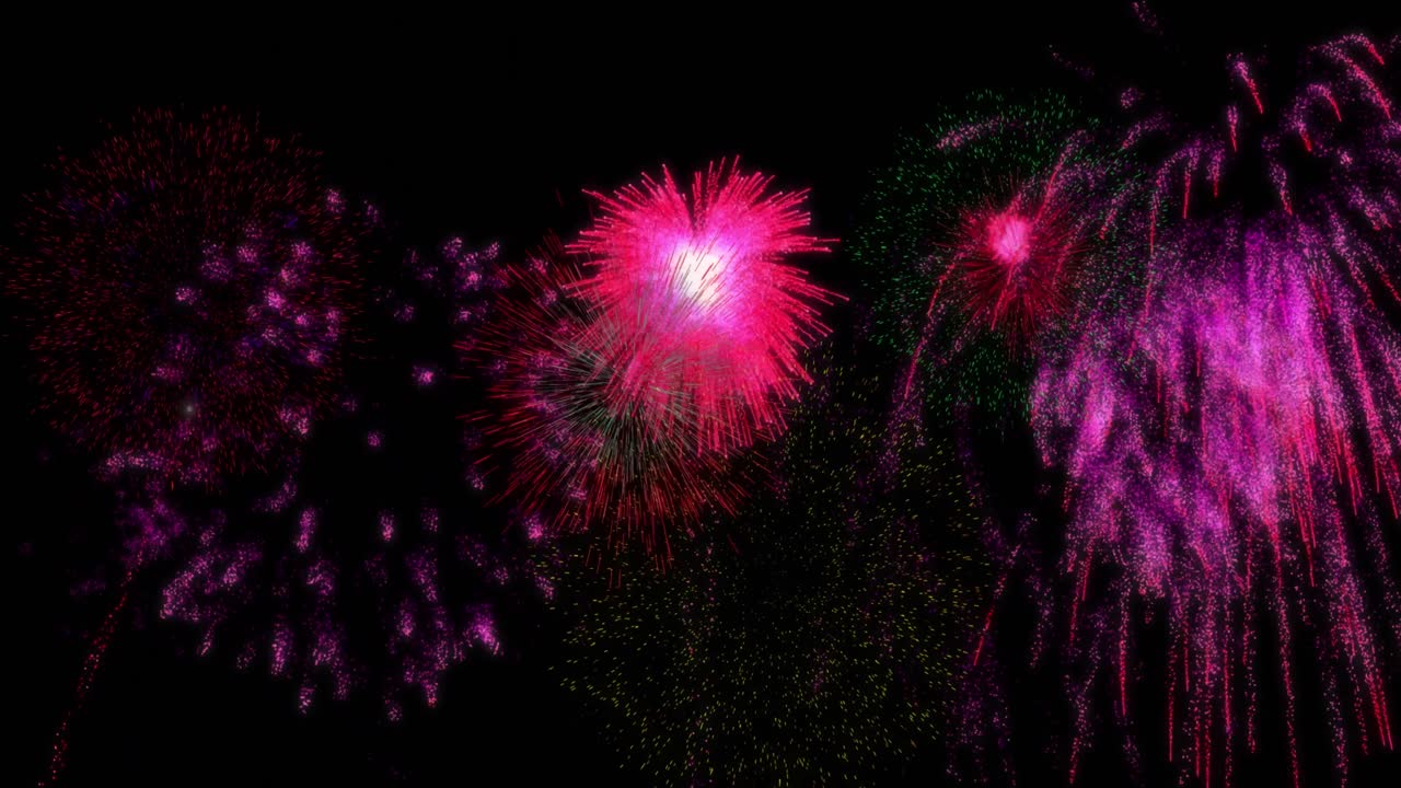 animación de coloridos fuegos artificiales de navidad y año nuevo que explotan en el cielo nocturno