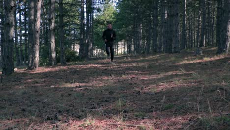 athlete running in a forest