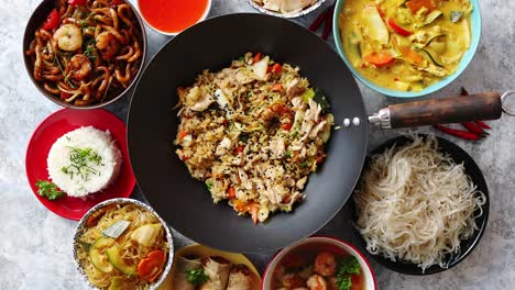 Asian-oriental-food-composition-in-colorful-dishware