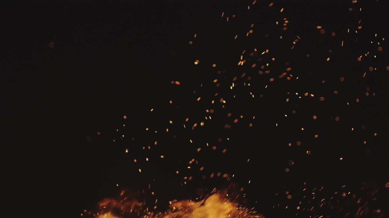 A mesmerizing display of fire and sparks in the dark