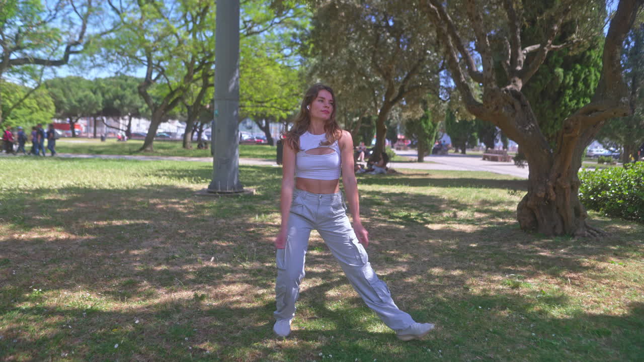 Woman Dancing in Park