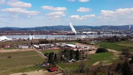 Industrial-Highway-Forward-Drone-Shot-with-Smoke-in-the-Background