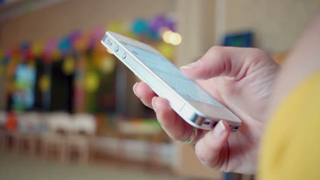 smartphone screen. woman typing message on smart phone. closeup