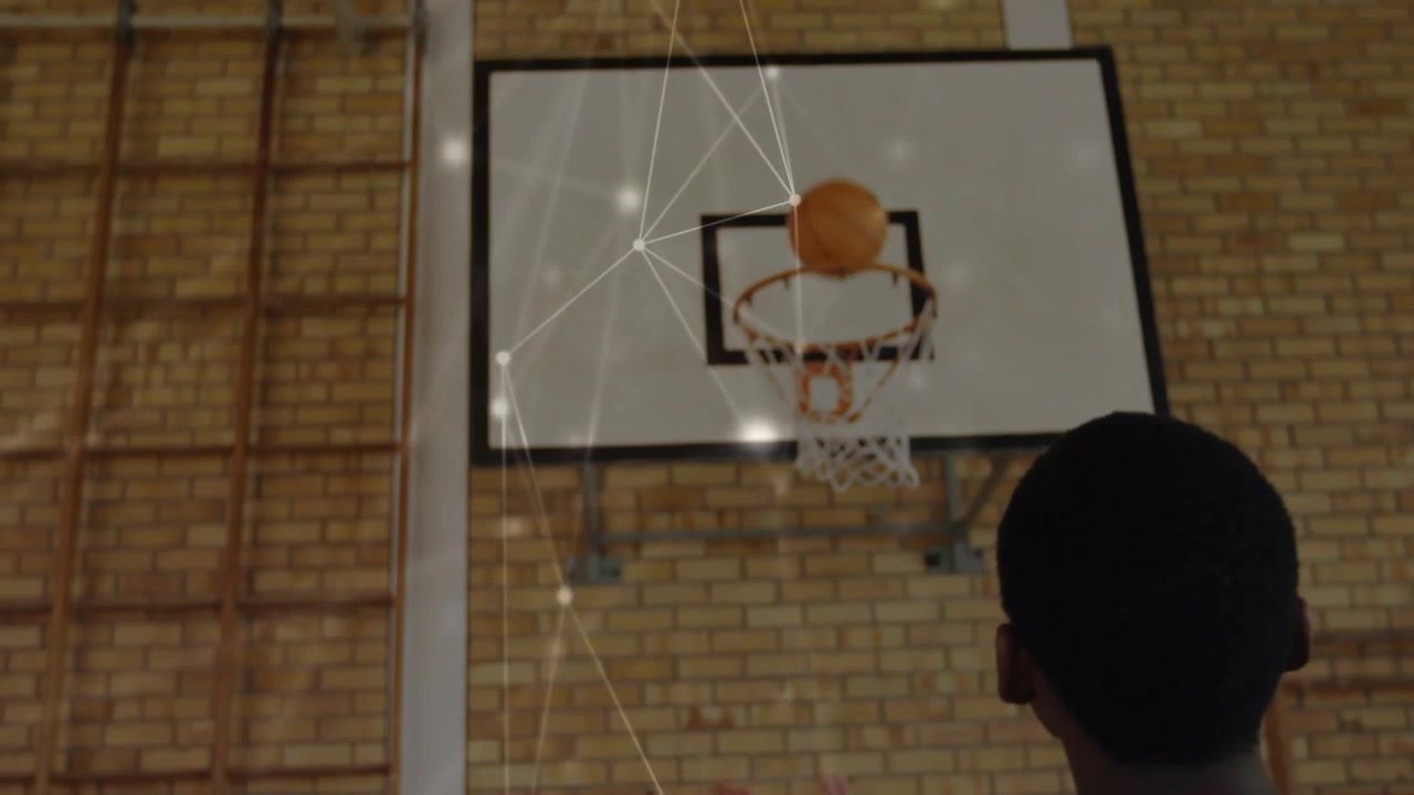Teen shooting ball at hoop in drill, bouncing rim then falling, coach signaling with whistle