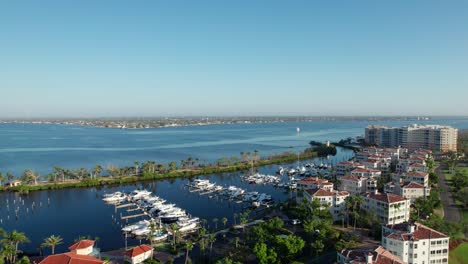 drone aerial shot over a harbor in fort myers, florida on a sunny morning