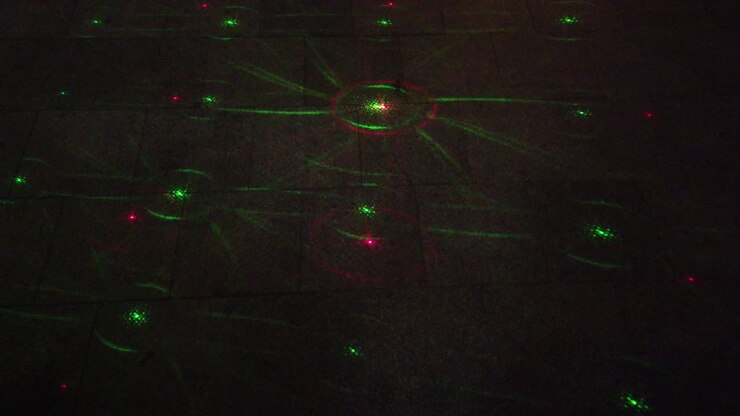 Laser beams on the night street
