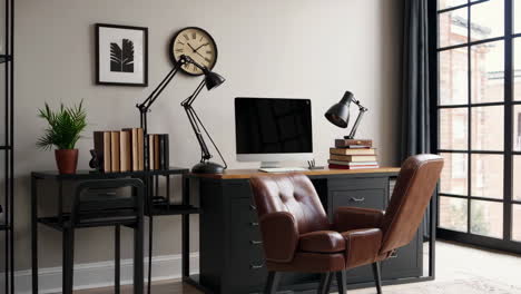 a modern home office with a brown leather chair, desk, computer, and lamps