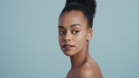 portrait-beautiful-young-african-american-woman-smooth-healthy-skin-looking-confident-gorgeous-sensual-beauty-on-blue-background-skincare-concept