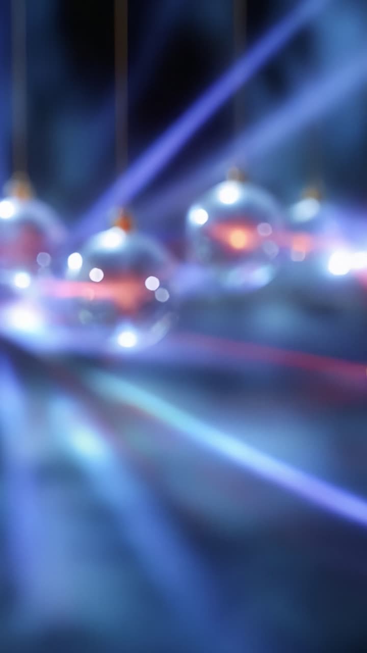 A Stunning Display of Illuminated Orbs Hanging in a Dark Atmosphere, Captivating the Viewer with a Mesmerizing Dazzle of Colors and Reflections, Enhanced by Striking Light Rays in the Background