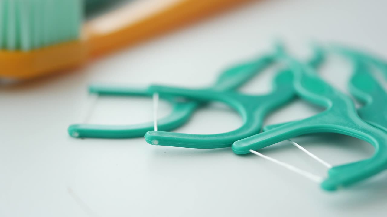 Dental Floss Picks and Toothbrush