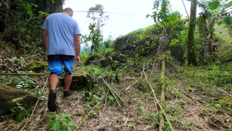 Man-walking-on-the-trail-in-the-woods,-healthy-life-in-nature,-healthy-fitness-lifestyle