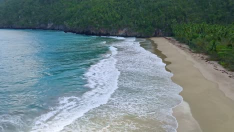 forward shot of el valle beach in samana, dominican republic- drone view