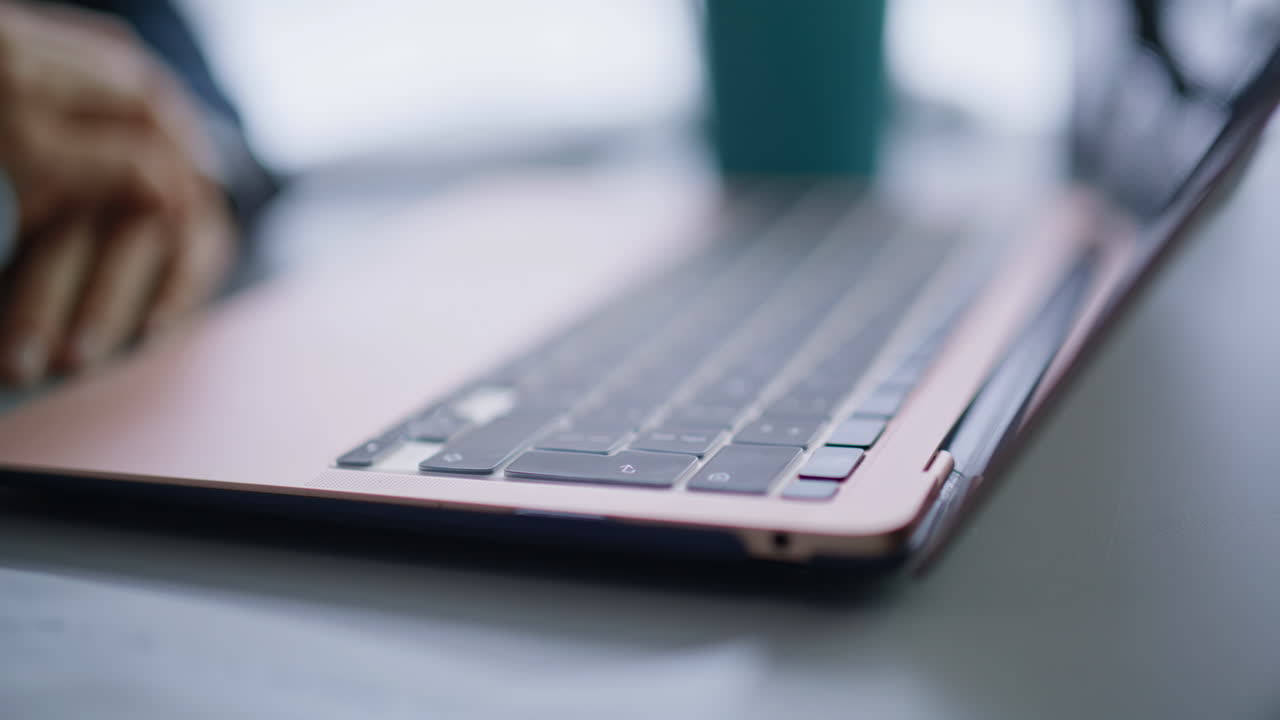 Woman finger pressing keyboard button using laptop busy online project closeup