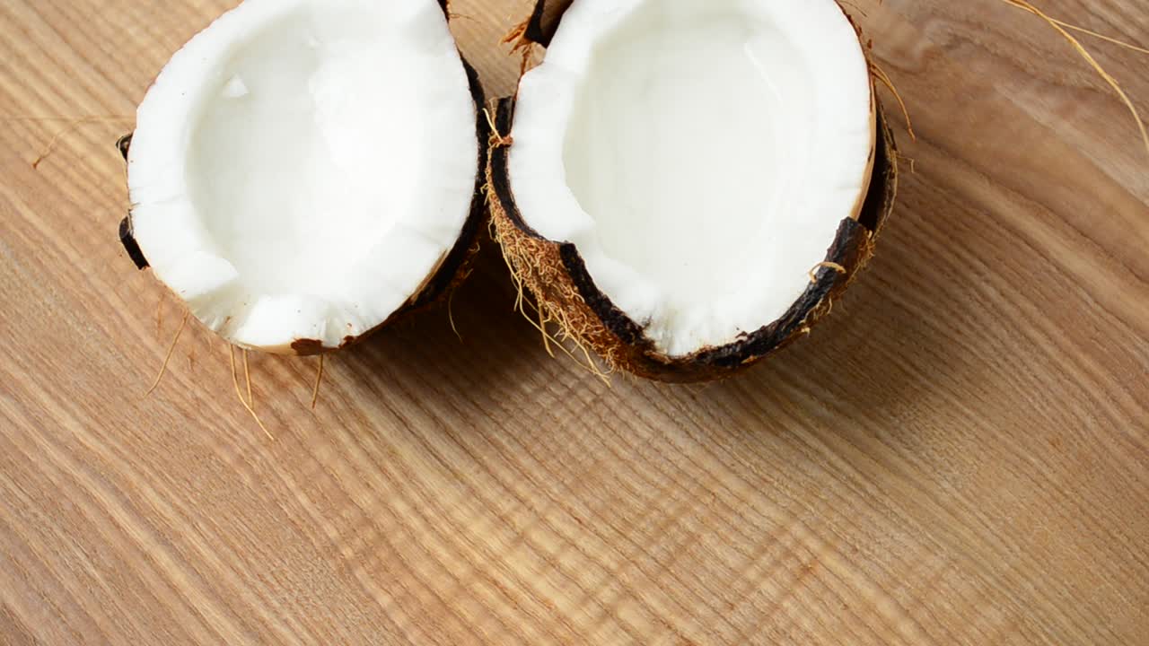Shooting of coconut. Coco in a section, juice