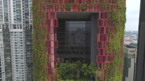 vertical garden facade of modern building in city