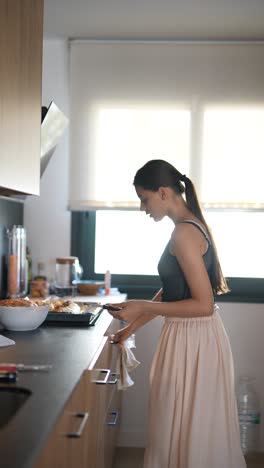 woman preparing food in a modern kitchen