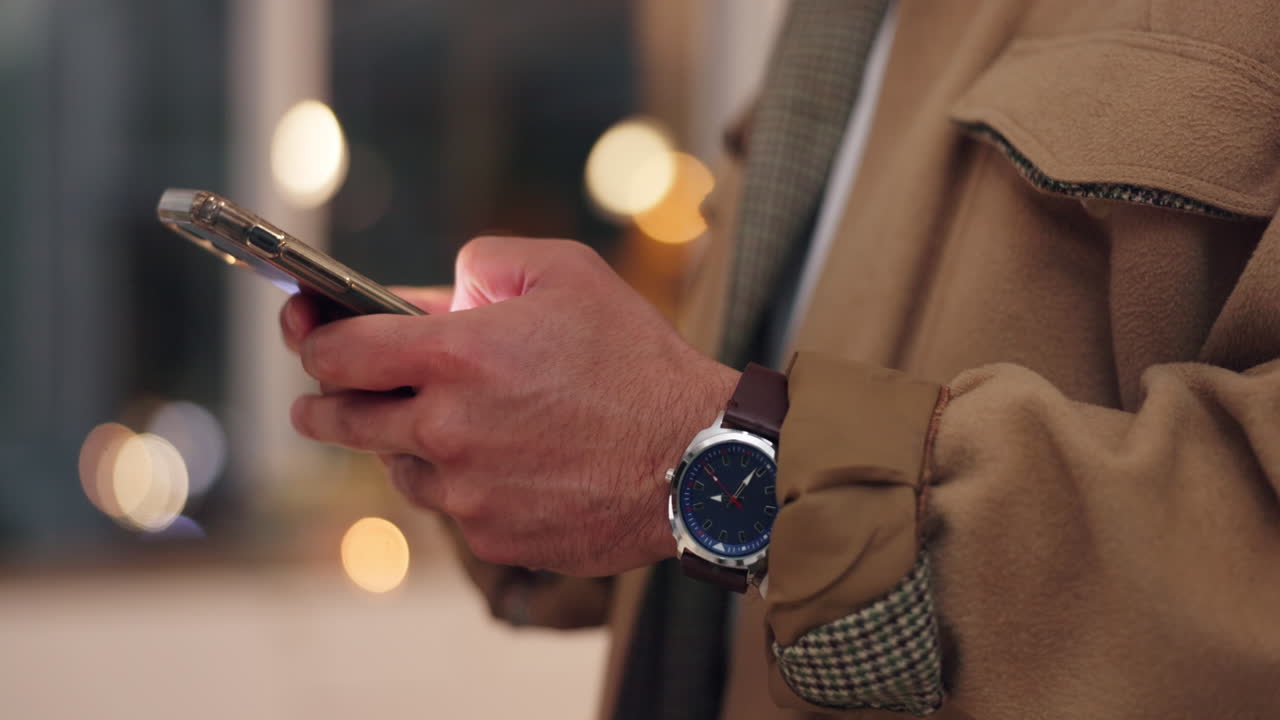 Man Using Smartphone at Night