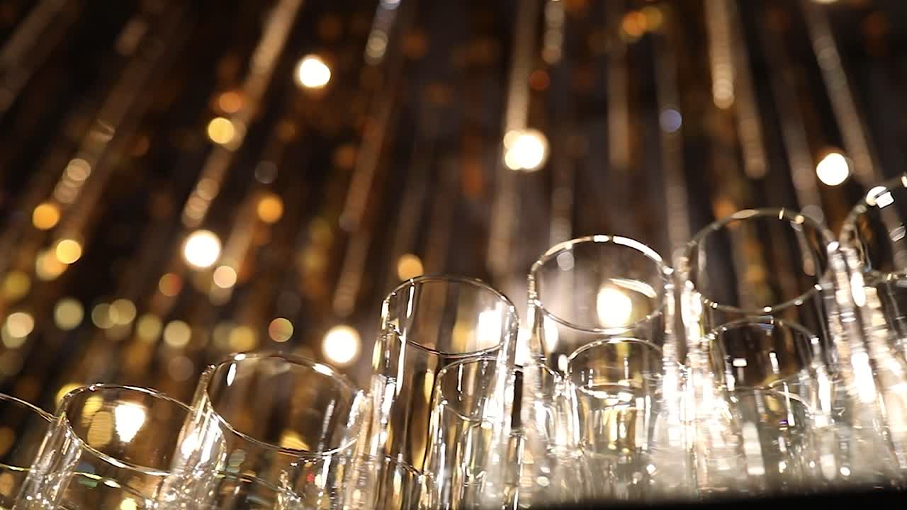 Wine glass cinematic shot on a bar
