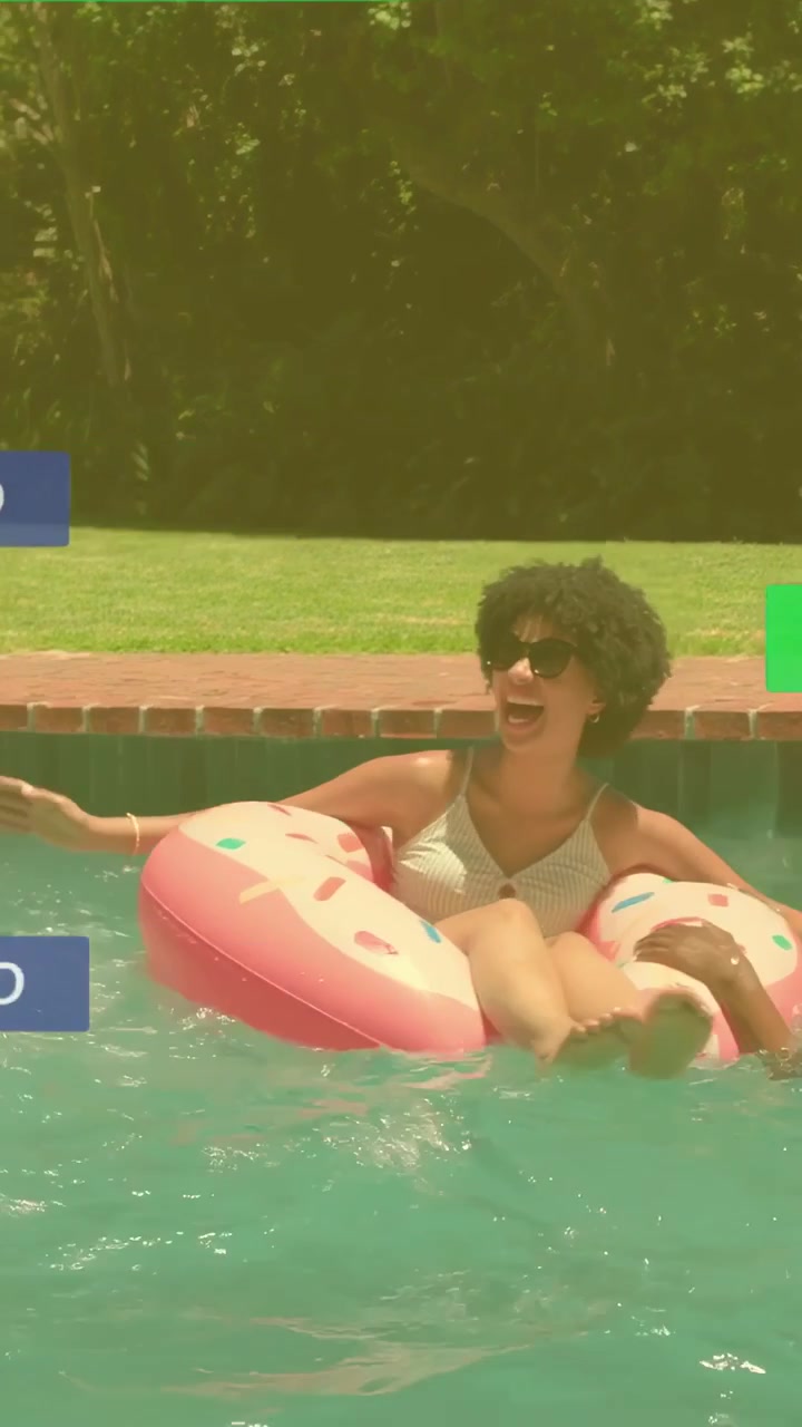 Vertical video: Woman kicking, splashing, sparking social CTAs while man swimming to steady donut