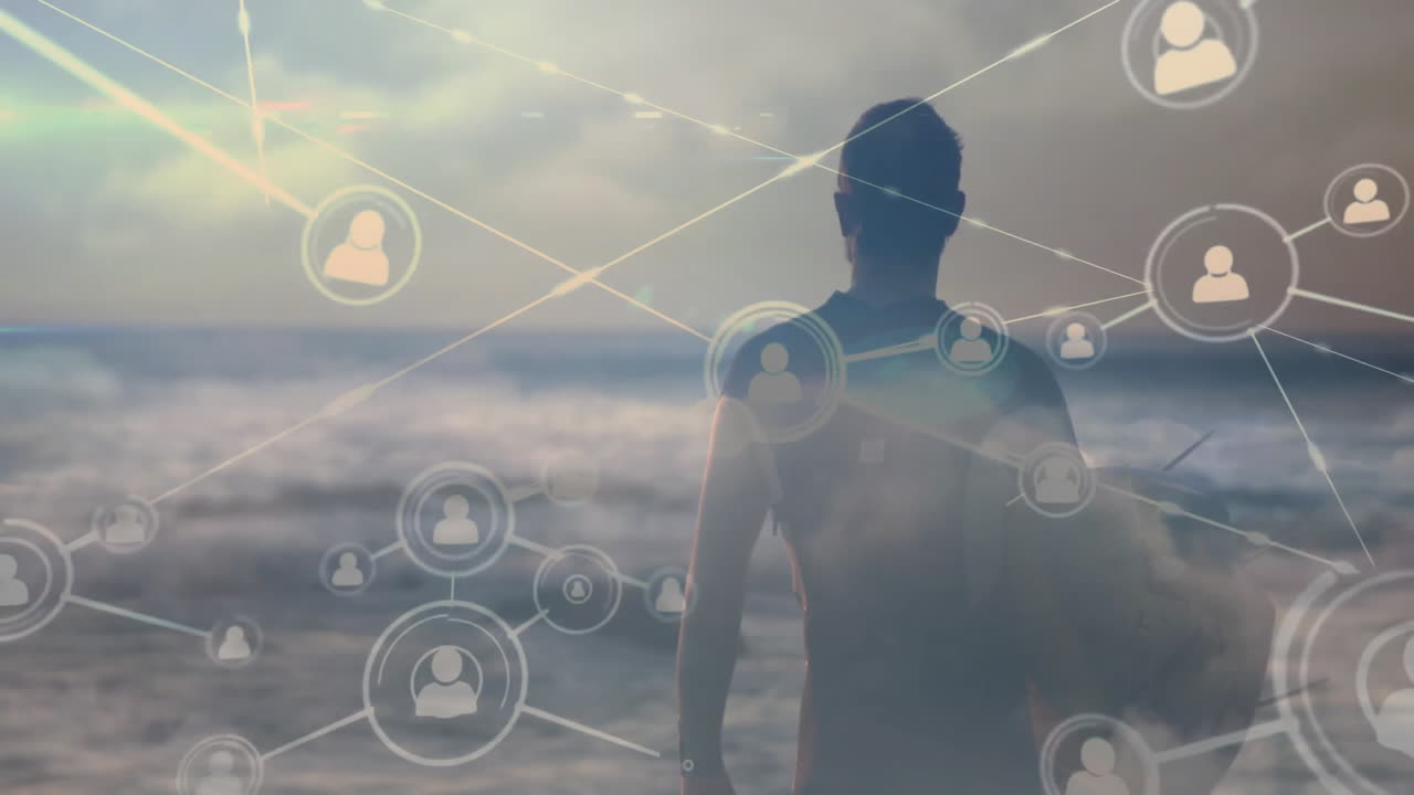 Man holding surfboard standing on beach, showcasing technology network icons and profile links