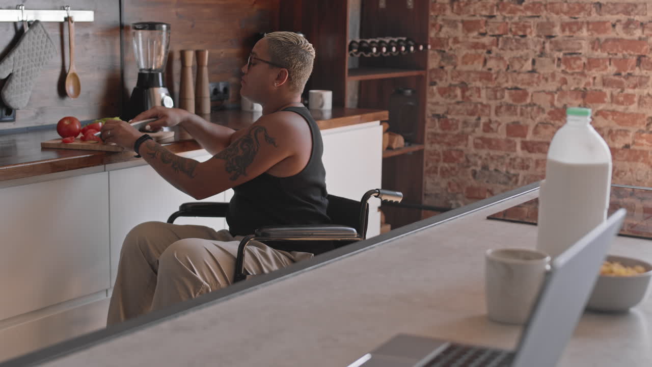 Woman with Disability Cutting Veggies