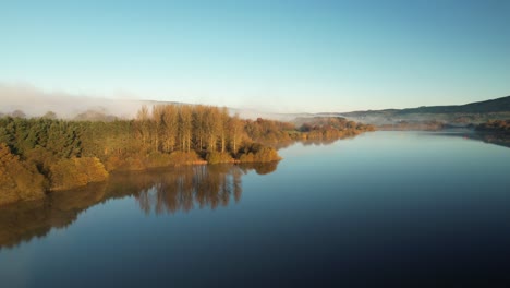 Lake-and-Autumn-nature-with-morning-fog