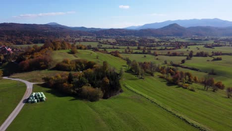 aerial panorama view slovenian countryside farmland with intermittent lake