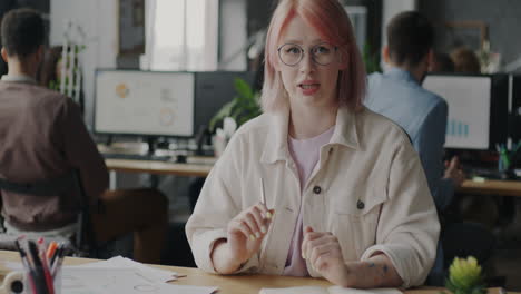 woman presenting data in an office setting