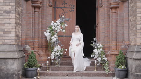 bride walking down church steps