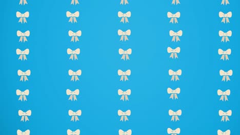 Animation-of-bow-ties-floating-over-blue-background