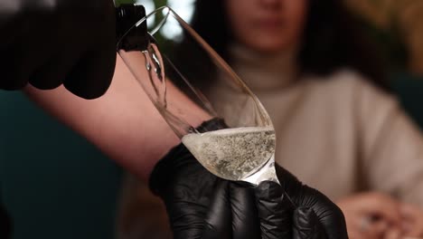champagne being poured into a glass