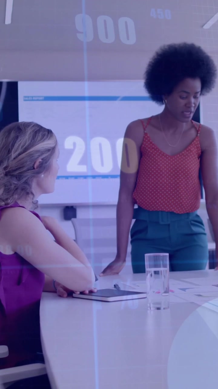 Animation of financial data processing over diverse business people in office