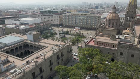 drone flies between guadalajara cathedral  spires in mexico