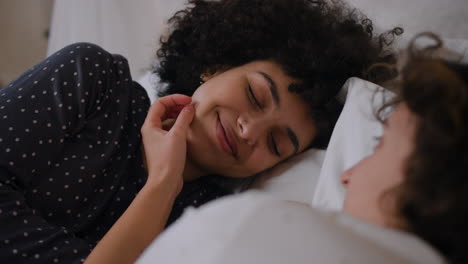 lovely women laying on bed